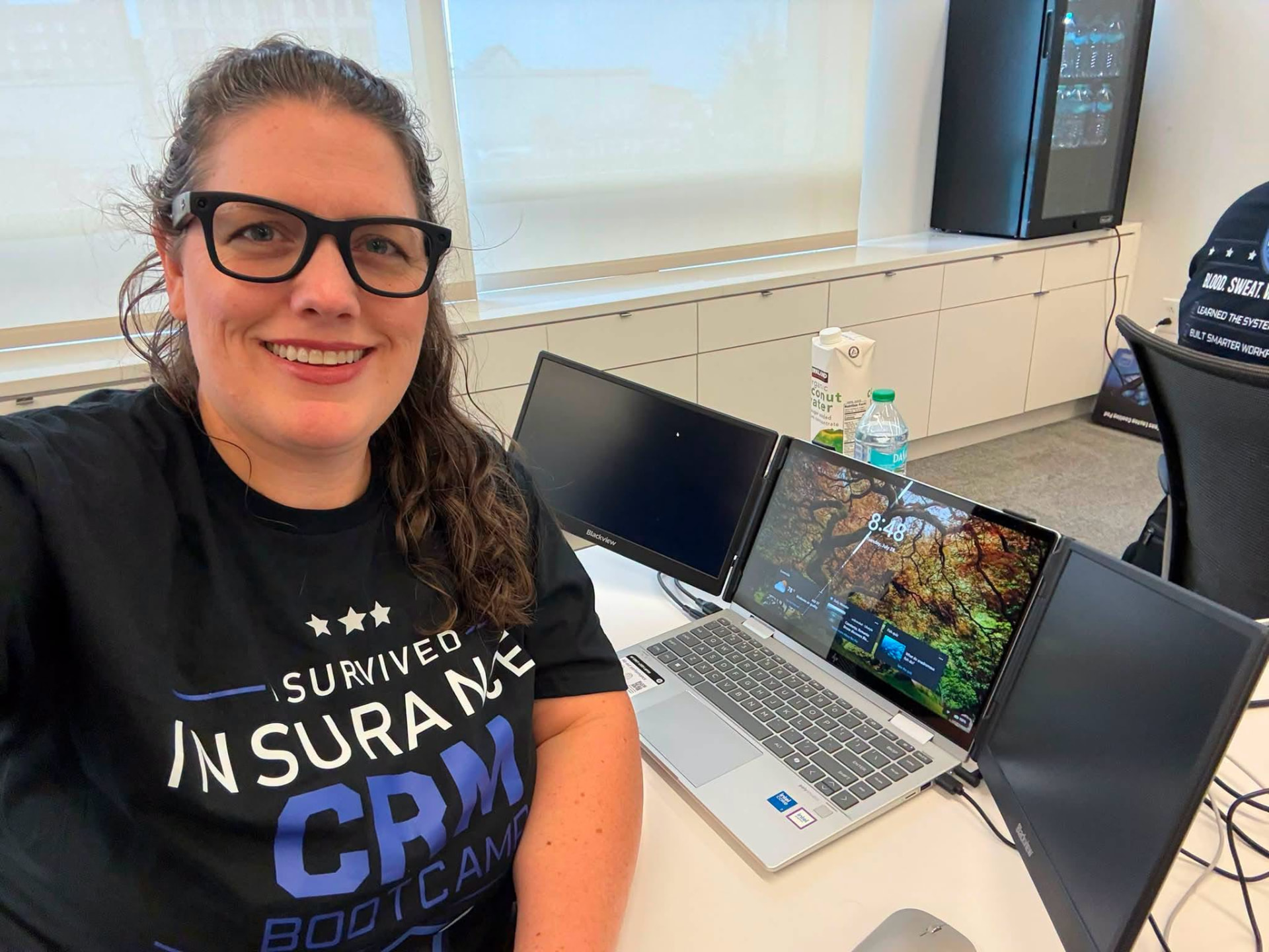 Agent at her multi-screen workstation during the bootcamp