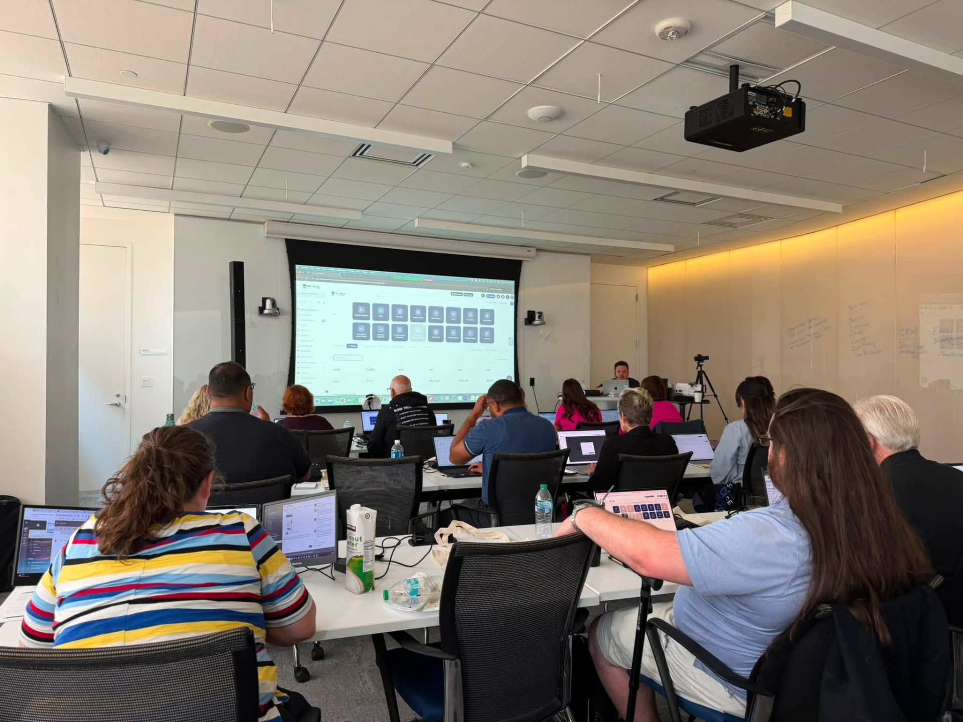 Agents working through CRM builds in the bootcamp training room